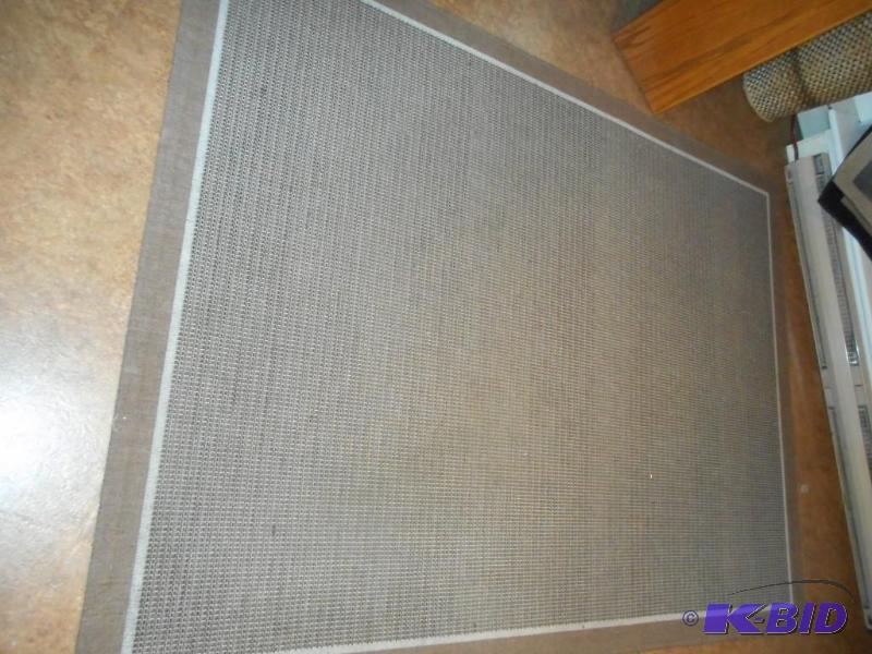 lot 8 image: Woven Rug