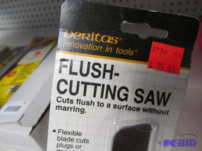 lot 36 image: Flush cut saw and 13 planer knives