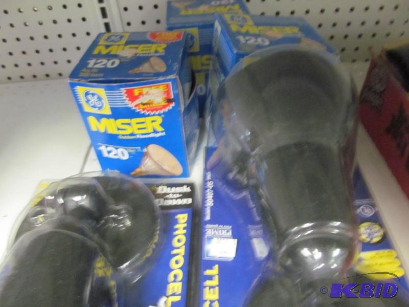 lot 56 image: Lot of 2 outdoor photocell lights and 100 watt bulbs