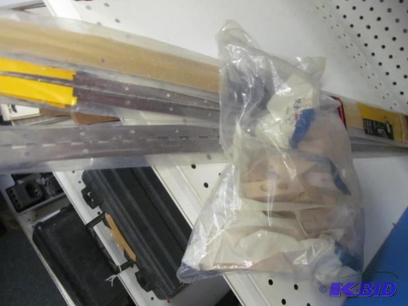 lot 91 image: lot of piano hinges, weather striping and inside cabinet support corners