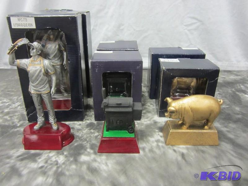 lot 67 image: Trophy toppers