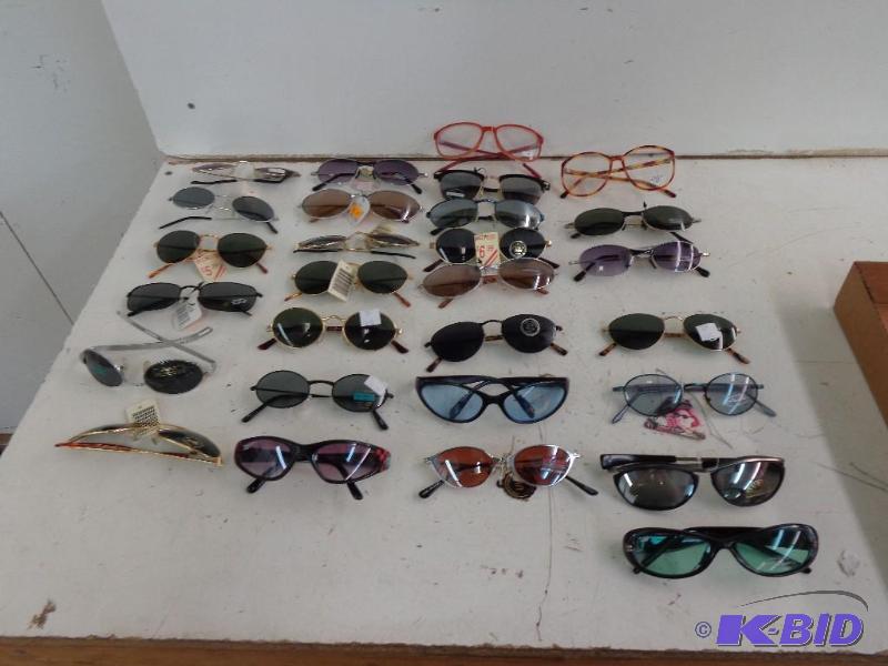 lot 106 image: 26 Pair of Assorted Sunglasses and 2 Pairs of...