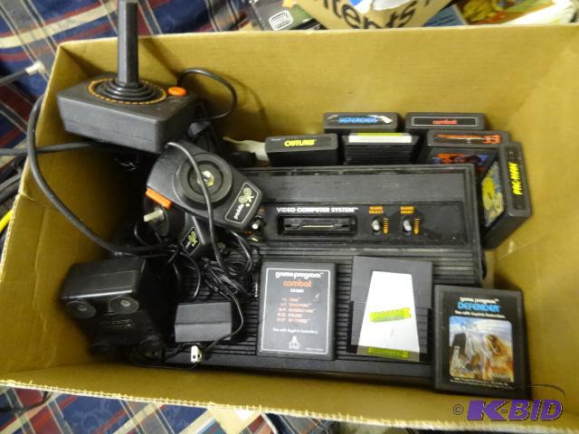 lot 133 image: Atari 2600 Game System. 12 Games and 5 Contro...