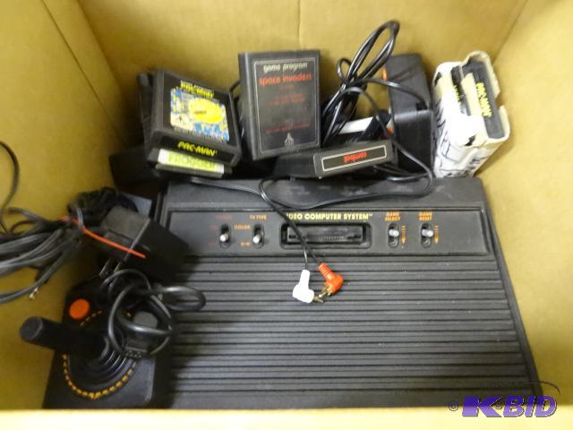 lot 134 image: 2 Atari 2600 Game Systems. 5 Controllers 6 Ga...