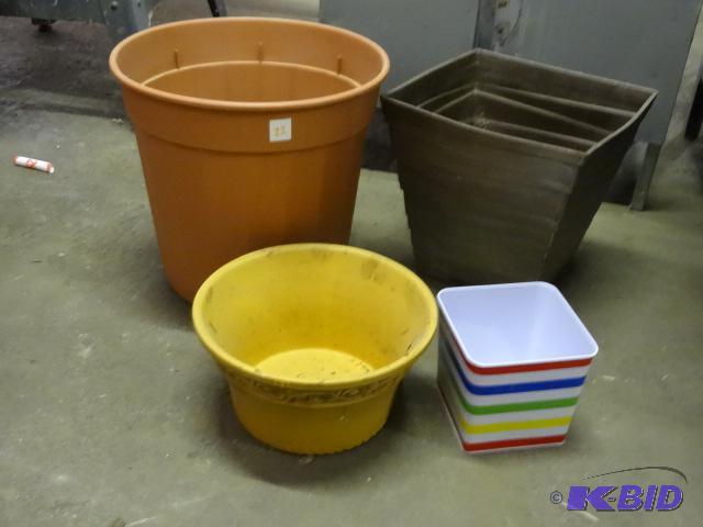 lot 22 image: 4-Flower Posts 2 Plastic, 1 Metal and 1 Cera...