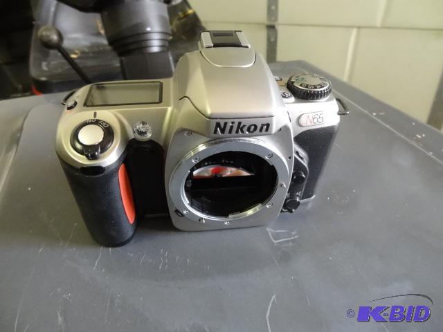 lot 95 image: Nikon N65 Camera-Needs Lens...
