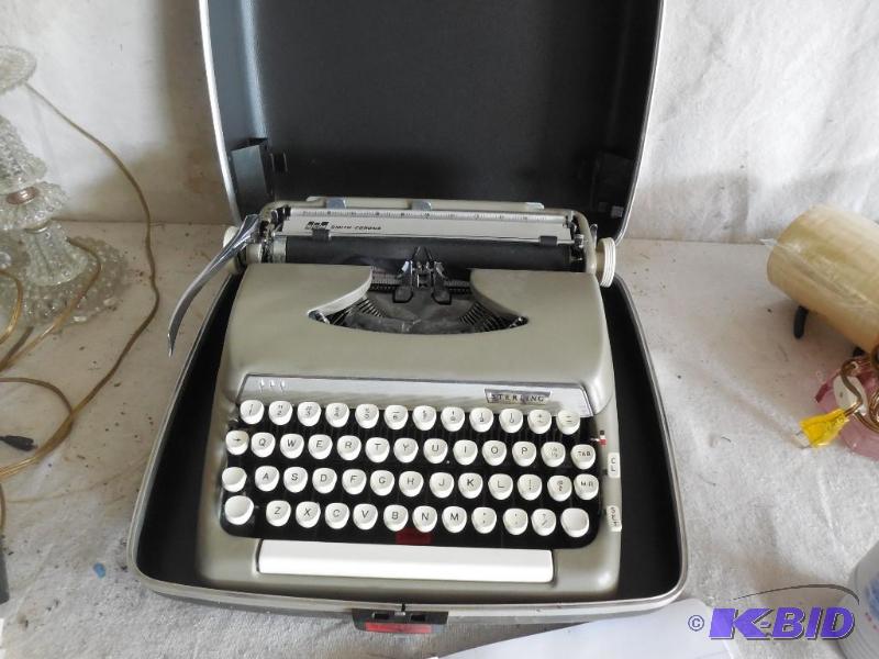 lot 104 image: Smith Corona sterling typewriter...