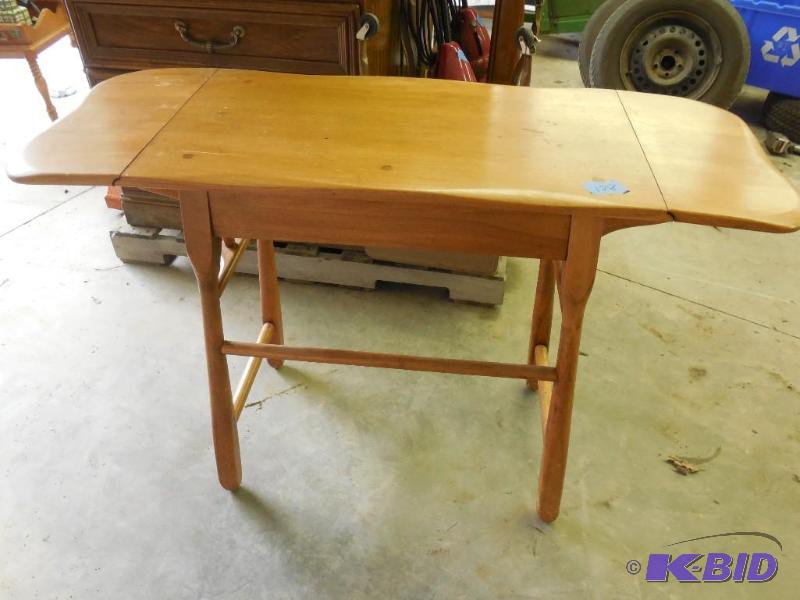 lot 128 image: 44" x 16" x 30" Table with fol...