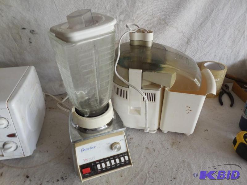 lot 166 image: Osterizer 14 speed blender and The Juiceman&n...