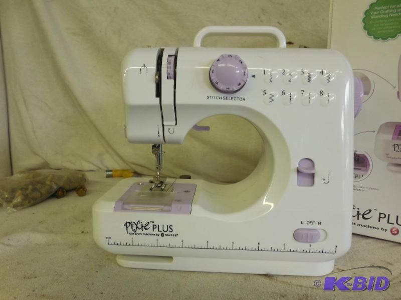 lot 63 image: Singer Pixie plus craft machine...