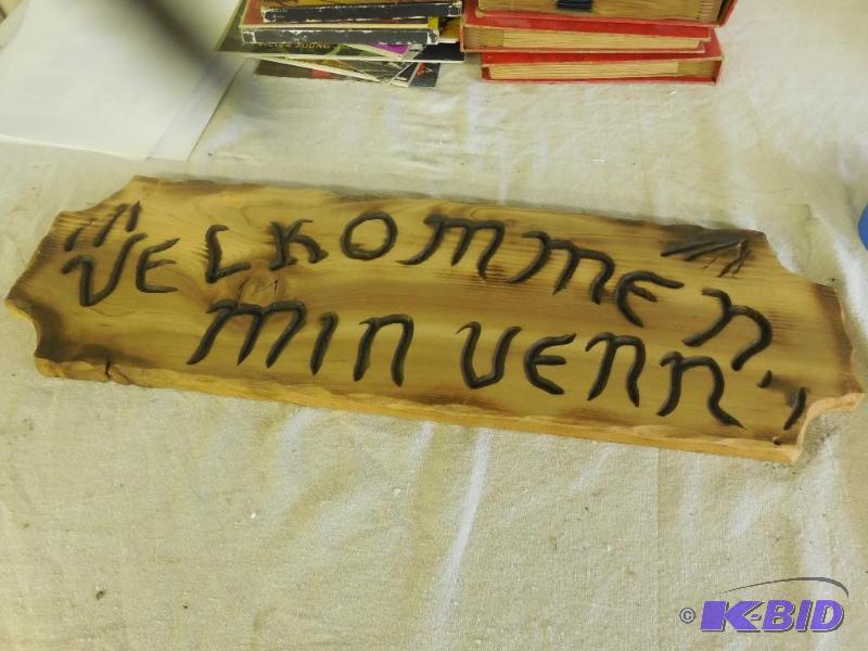 Welcome sign made of wood, in german...