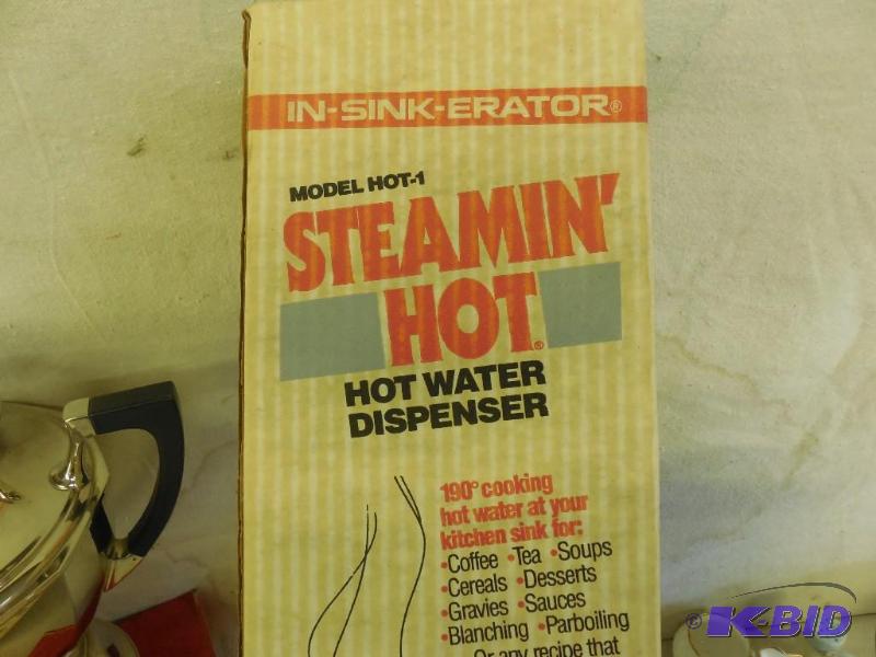 Hot water dispenser, looks new in the box...