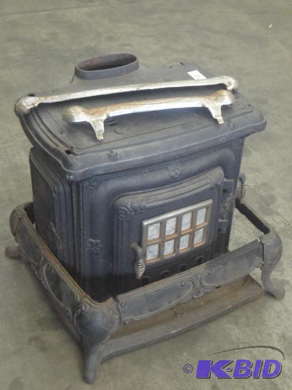 lot 58 image: Vintage Cast Iron Wood Stove With Stand, Good...