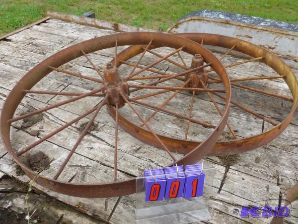 lot 1 image: Pair of vintage steel wagon wheels. 46" ...