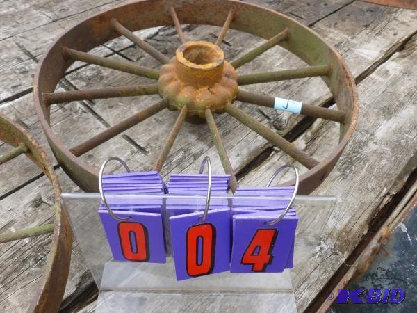 lot 4 image: Single vintage steel wagon wheel. 24" di...