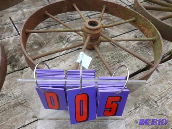 lot 5 image: Single vintage steel wagon wheel. 24" di...
