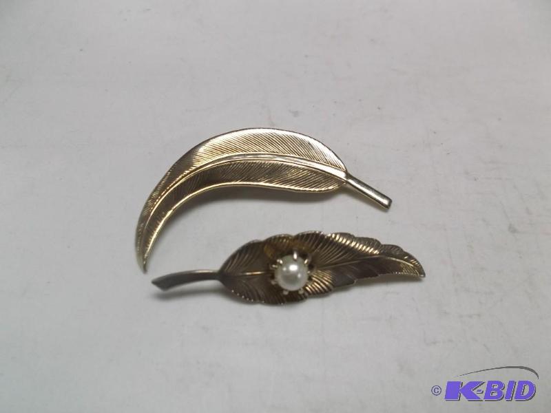 Two Gold Tone Feather Brooch Pins...