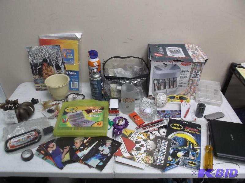Gray Bin With Some Random items. Temp Tattoos...
