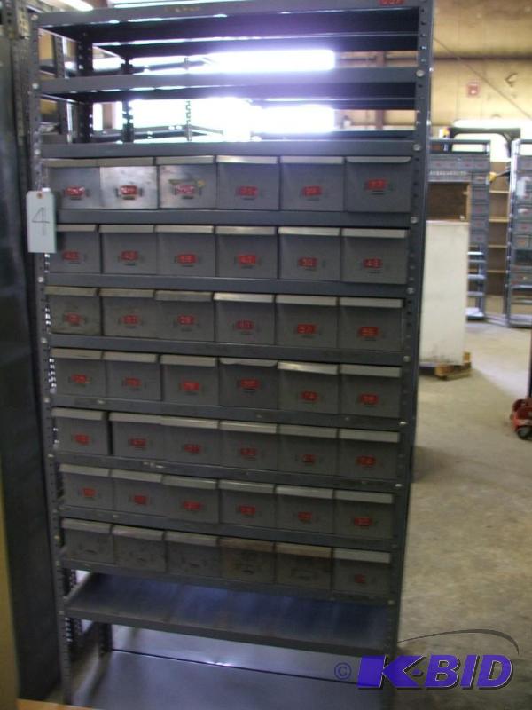 2 sections of parts shelving with parts bins,...