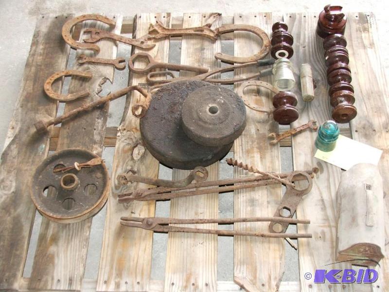 Antique blacksmith tools and glass insulators...