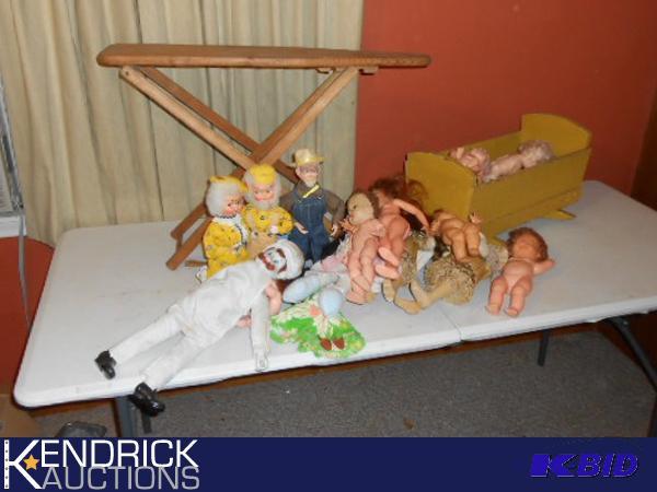 lot 107 image: Lot of Vintage Dolls, Crib, and Ironing Board
