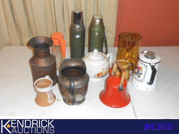 lot 131 image: Lot of Tea Pots, Plated Silver Pitchers, and Cups