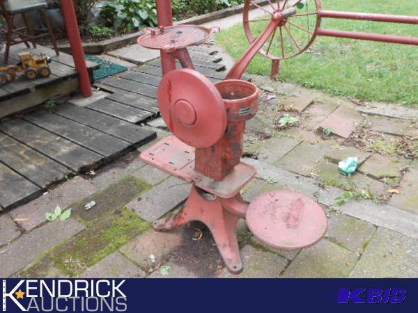 lot 151 image: Antique Cream Separator Lawn Ornament Planter