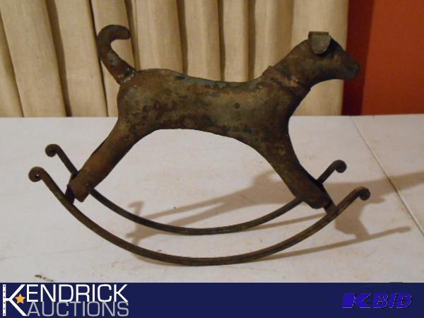 lot 163 image: Antique Tin Dog Rocking Horse
