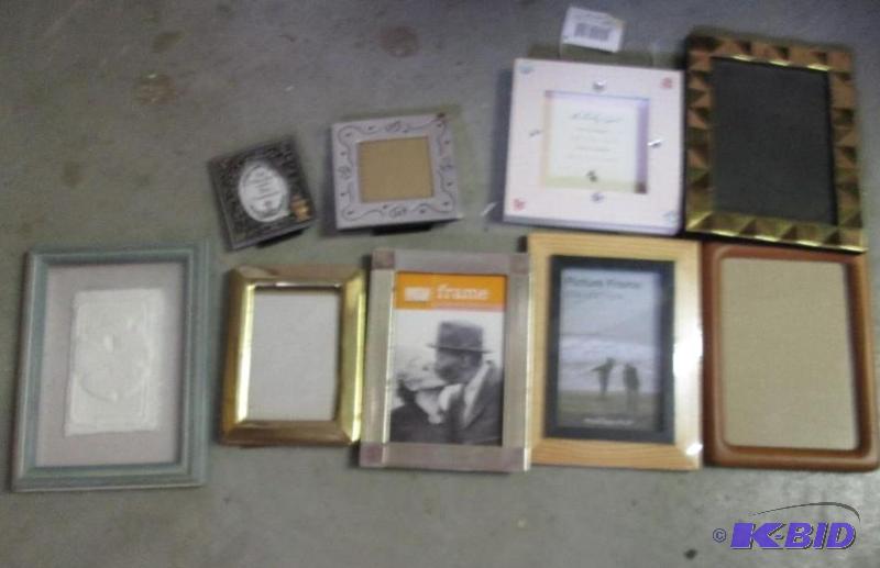 lot of picture frames and first communion fra...