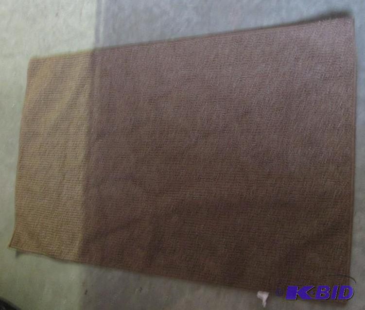 brown rug  44.5in x 27in...
