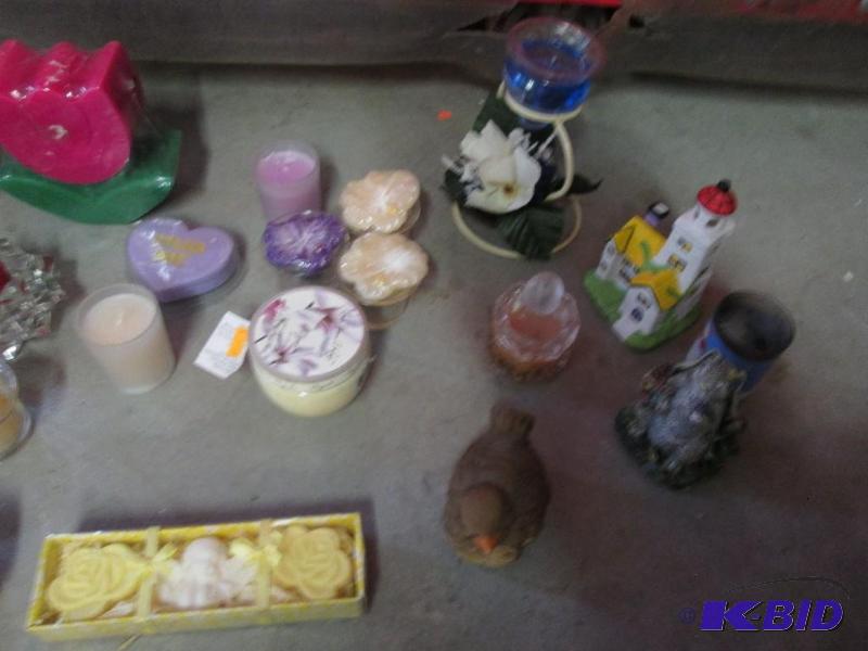 mixed lot of candles, candle holders, and hom...