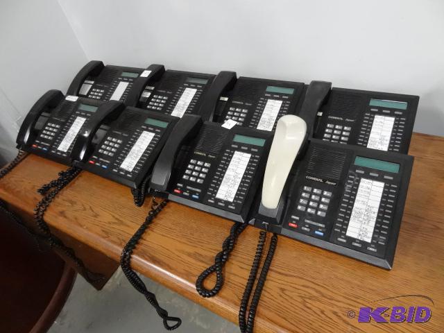 lot 144 image: Comdial impact office phones. Qty. 8...