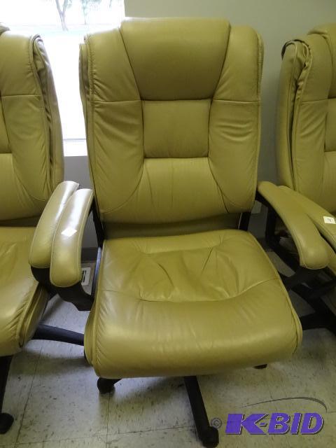 lot 3 image: Leather office chair on wheels. Adjustable he...