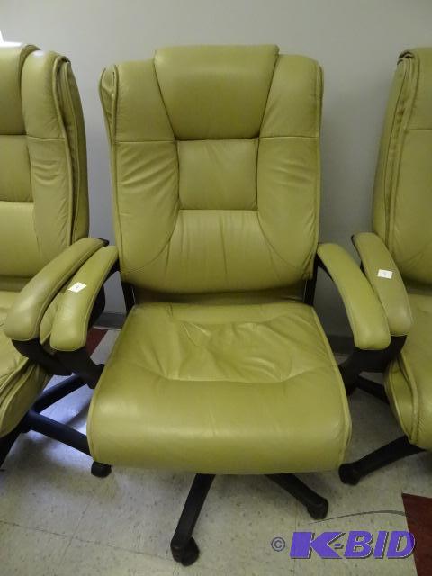 lot 4 image: Leather office chair on wheels. Adjustable he...