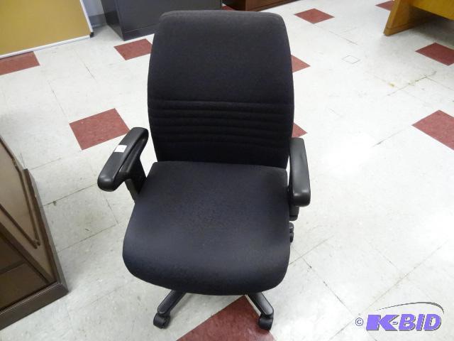 lot 49 image: Office chair on wheels....