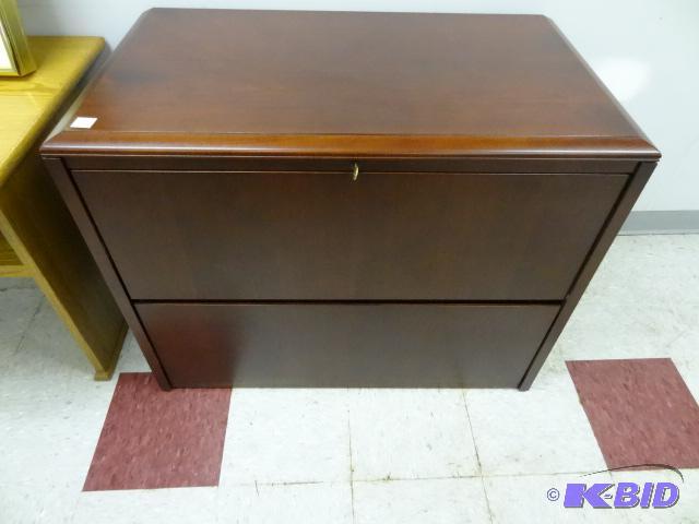 lot 56 image: Wood 2 drawer lateral file. 38 x 22 x 30. Has...