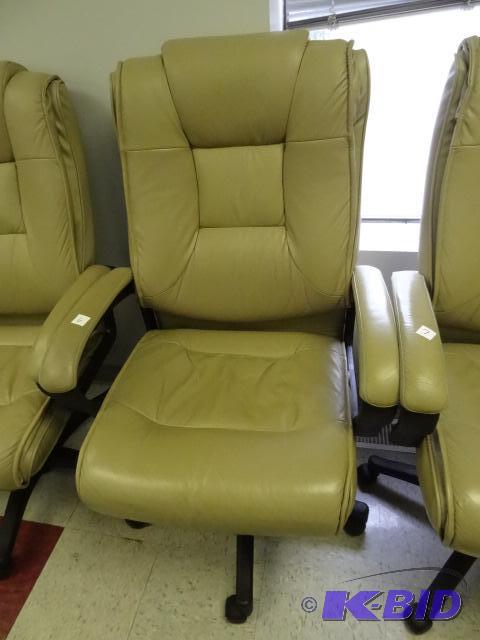 lot 6 image: Leather office chair on wheels. Adjustable he...