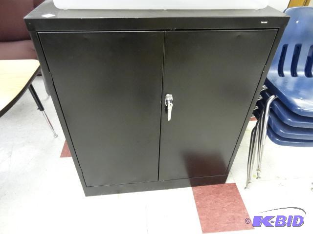 lot 70 image: Tenneco 2 door metal cabinet. 2 shelves. 36 x...