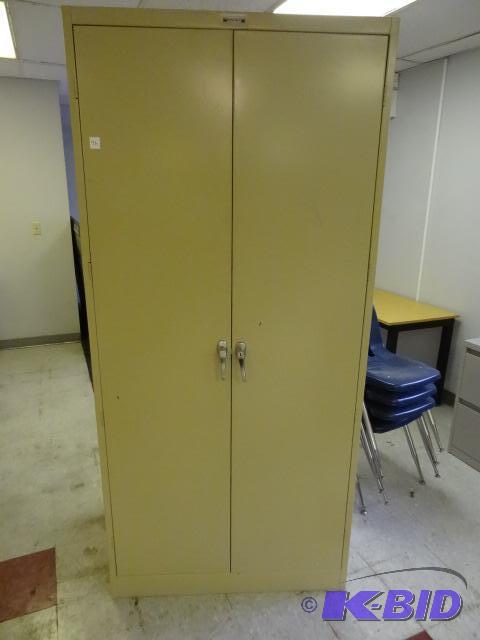 lot 96 image: 2 door metal cabinet. 2 drawers...