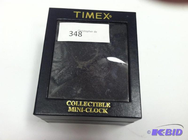 lot 304 image: Timex (Golf Themed) Collectable Clock....