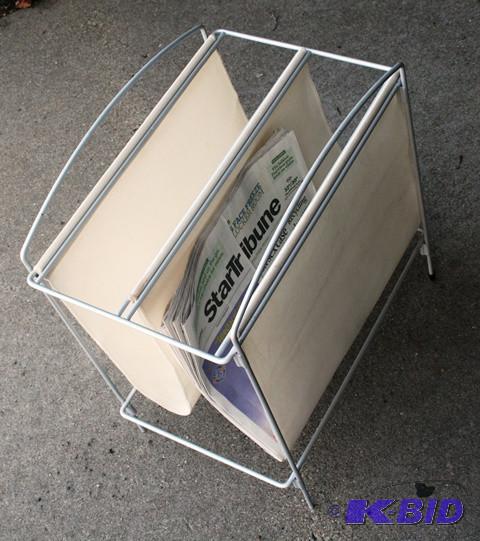 lot 3142 image: Newspaper rack....