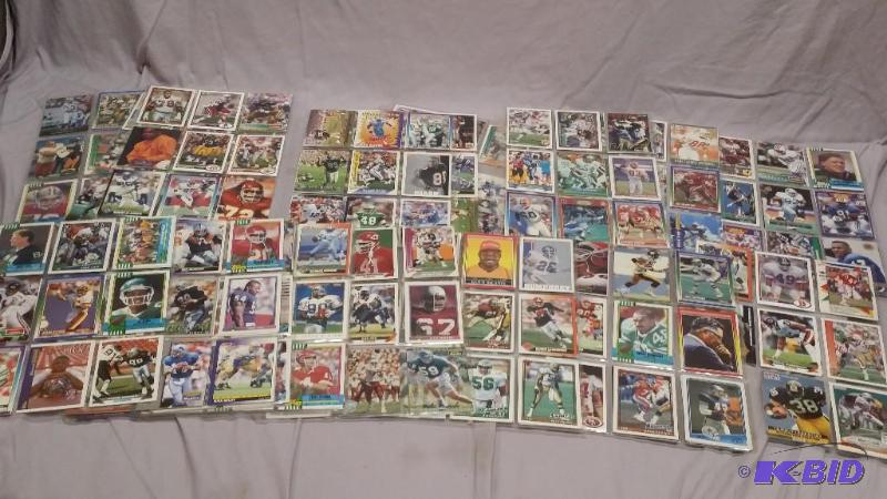 Over 15 sheets and 250 Football cards...