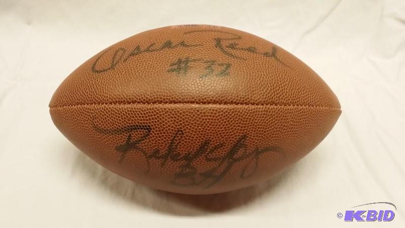 Football signed by Oscar Reed # 32 and Rufus ...