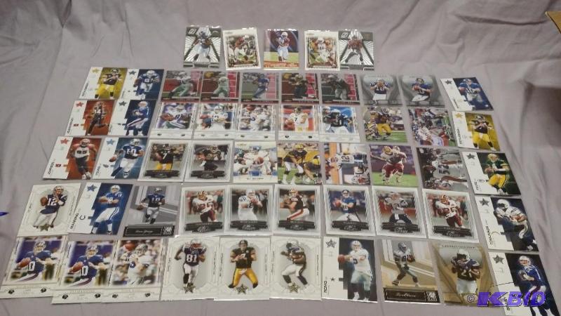 55 Football cards including Tom Brady, Eli M...