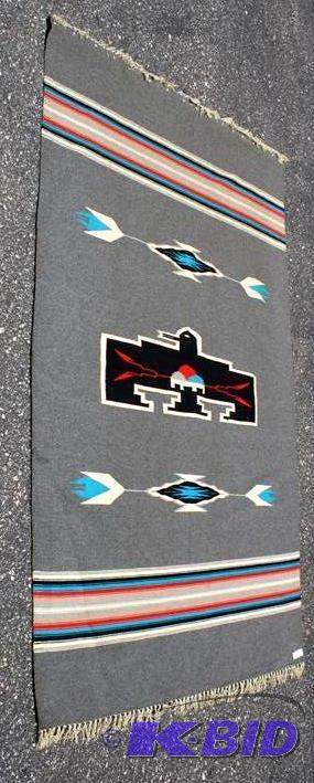 lot 21 image: Navajo Indian blanket attached to wooden wall...