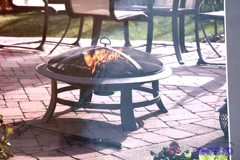 lot 22 image: Steel 26" fire pit new in box, shrink wr...