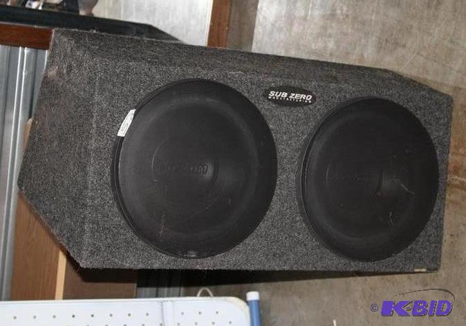 lot 52 image: Boston acoustics speakers in a Sub Zero box, ...
