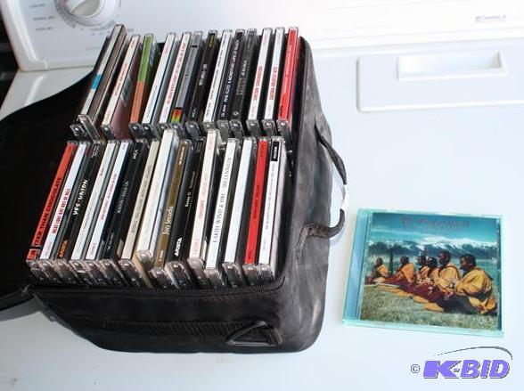lot 53 image: 30 music cds Santana, Whitney Houston,&nbspI...