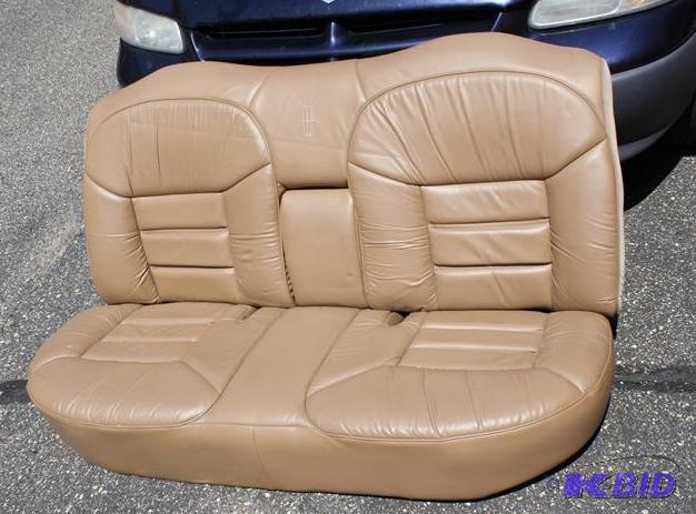 lot 73 image: Leather Lincoln Rear car seat plus a Ford F15...