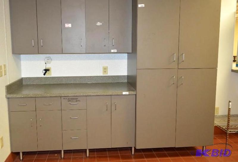 lot 136 image: Base(lower) cabinet only, wood with Corian co...
